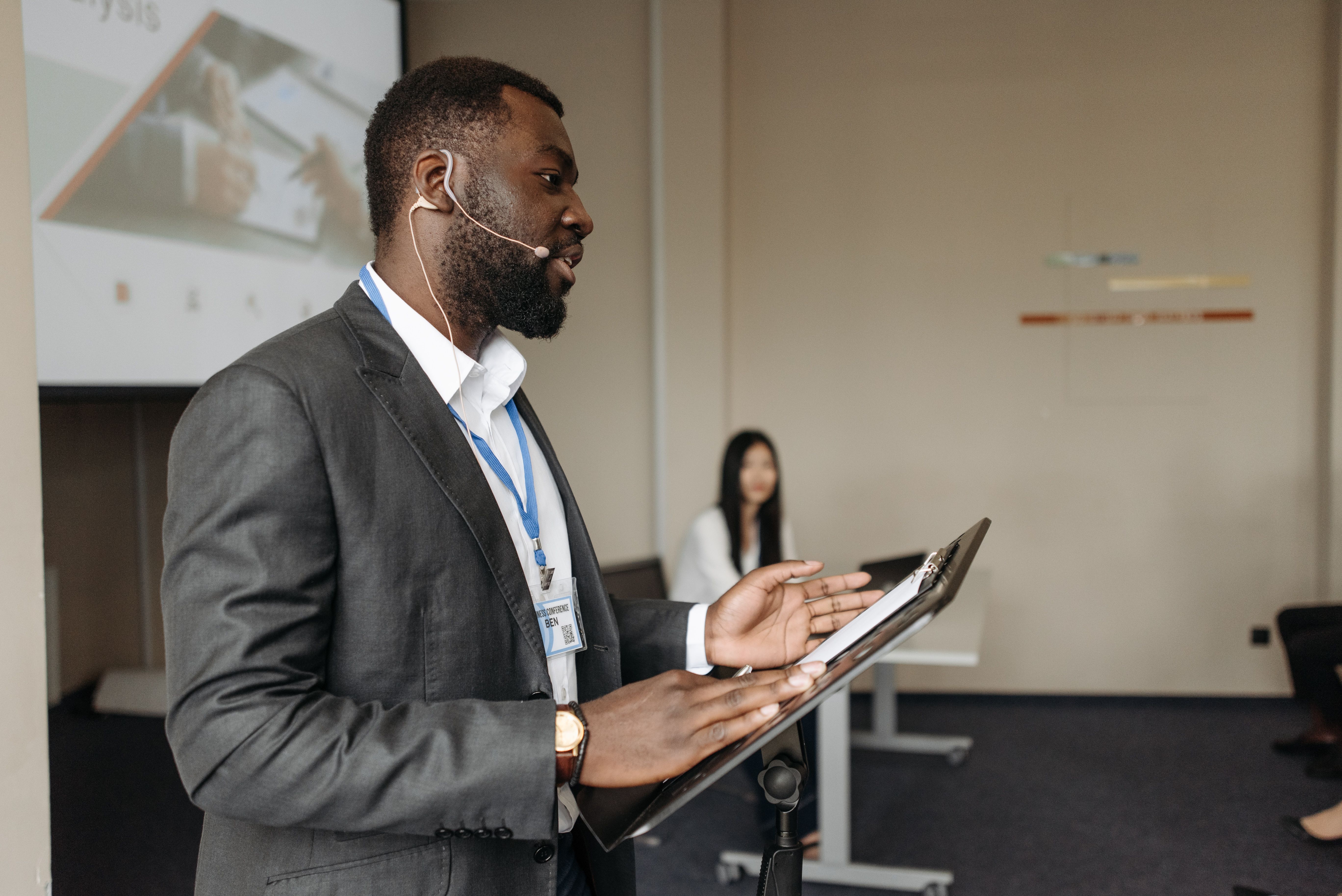 A Black professional presenting a strategic briefing